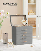 SONGMICS GISELLA Collection - Jewelry Box Organizer, 6-Layer Jewelry Storage with 5 Drawers, Shiny Metal Hardware, Glass Lid, Modern, 6.4 x 9.9 x 11.4 Inches, Dove Gray and Gold Color UJBC171G01