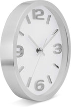 Bernhard Products Modern Wall Clock 10 Inch Silver Silent Non Ticking Battery Operated Round Elegant Metal Quality Quartz for Kitchen Home Office Clock with 3D Numbers, Easy to Read