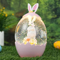 Easter Snow Globe Decorations for The Home Lighted Bunny Statue with Easter Eggs, Perfect Spring Decor and Gifts, Pink