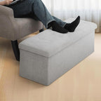 MoNiBloom 43 Inch Folding Storage Ottoman Bench, Linen Fabric Ottoman Footrest, Storage Chest, Padded Seat, End of Bed Bench for Living Room, Bedroom, Entryway, Light Gray