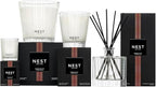NEST New York Reed Diffuser, Something Tropical - 5.9 fl oz - Fragrance for Up to 90 Days - Reusable, Refillable Glass Holder - Includes 8 All-Natural Reed Sticks - Flame Free
