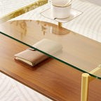 Oval Glass Coffee Table, Mid-Century Modern Design, L41 x W21 x H17 inch, for Living Room, 2-Tier Structure, Clear Glass Top and Walnut Finish Wood Shelf, Conical Legs with Gold Finish Frame